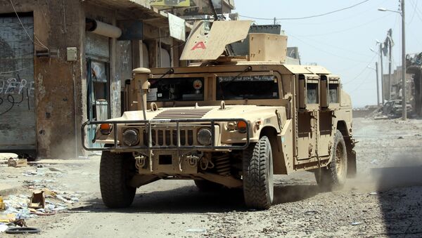 Un vehículo militar en Al Raqa (imagen referencial) - Sputnik Mundo