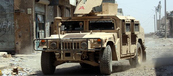Un vehículo militar en Al Raqa (imagen referencial) - Sputnik Mundo