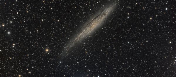 La galaxia NGC 4945 - Sputnik Mundo