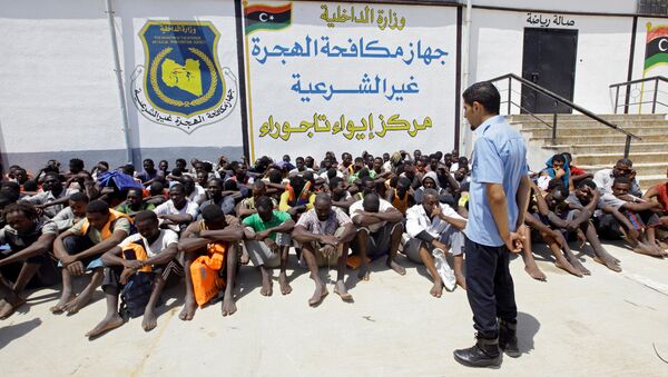 Migrantes libios - Sputnik Mundo
