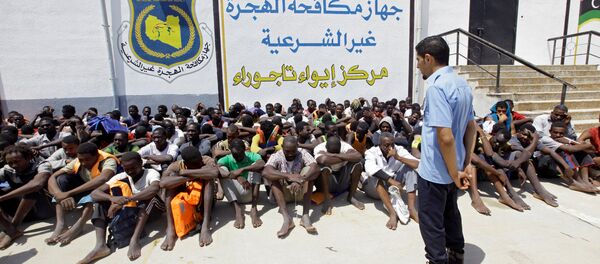 Migrantes libios - Sputnik Mundo