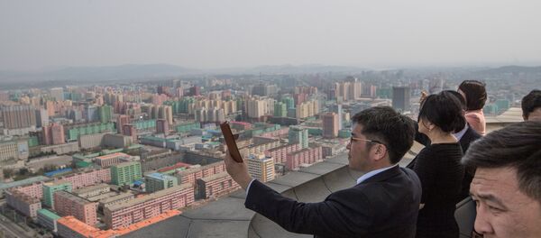 Los turistas en Pyongyang, Corea del Norte - Sputnik Mundo