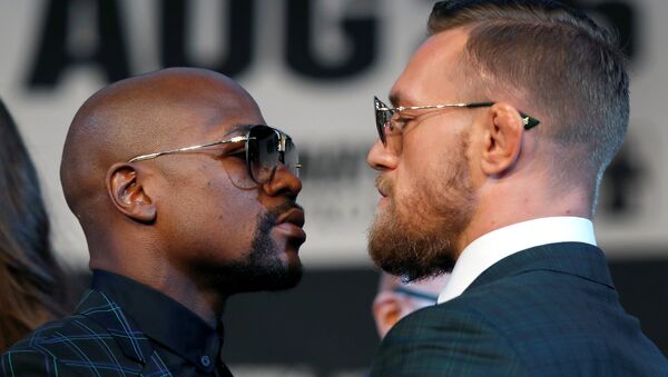 El luchador de MMA, Conor McGregor, y el boxeador Floyd Mayweather (archivo) - Sputnik Mundo