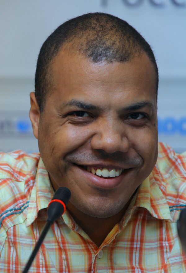 El afrodescendiente y conocido bloguero de Rusia Samson Sholademi  - Sputnik Mundo