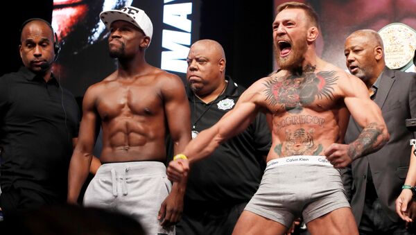 El boxeador Floyd Mayweather y el luchador de MMA, Conor McGregor - Sputnik Mundo