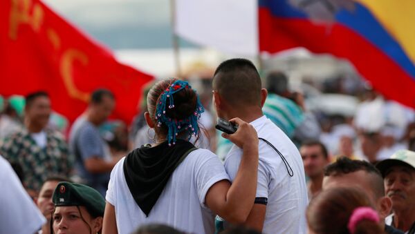 Fighters from Revolutionary Armed Forces of Colombia (FARC),are seen during the closing ceremony of a rebel congress near El Diamante in Yari Plains, Colombia - Sputnik Mundo