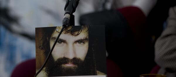Un cartel con la imagen de Santiago Maldonado, activista argentino desaparecido (archivo) - Sputnik Mundo