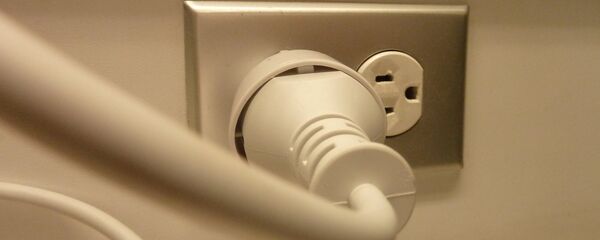 Un enchufe (imagen referencial) - Sputnik Mundo