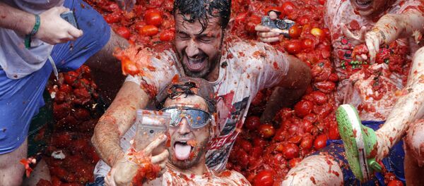 La Tomatina anual en España - Sputnik Mundo