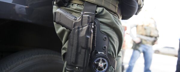 Policía armado de EEUU (imágen referencial) - Sputnik Mundo