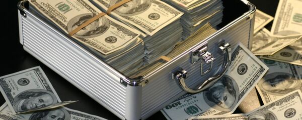 Dólares (imagen referencial) - Sputnik Mundo