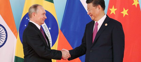 El presidente de Rusia, Vladímir Putin, y el presidente de China, Xi Jiping - Sputnik Mundo