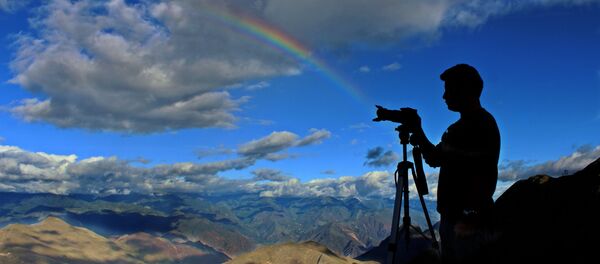 Un fotógrafo (imagen referencial) - Sputnik Mundo