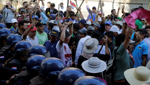 Protestas de agricultores en Asunción, la capital de Paraguay Protestas de agricultores en Asunción, la capital de Paraguay - Sputnik Mundo