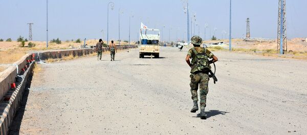 Un militar del Ejército sirio - Sputnik Mundo