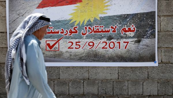 Un cartel con la fecha del refernéndum independista de los kurdos iraquíes Un cartel con la fecha del refernéndum independista de los kurdos iraquíes - Sputnik Mundo