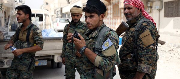 Los combatientes de las Fuerzas Democráticas de Siria - Sputnik Mundo