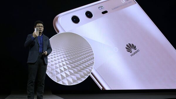 Director ejecutivo de Huawei, Richard Yu, durante una presentación - Sputnik Mundo