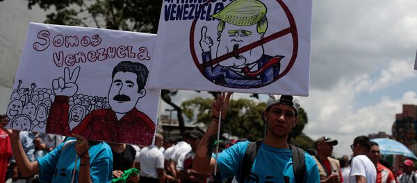 Los partidarios del presidente de venezuela, Nicolás Maduro - Sputnik Mundo