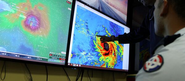 El Centro de Operaciones de Emergencias monitorean el huracán María, República Dominicana - Sputnik Mundo