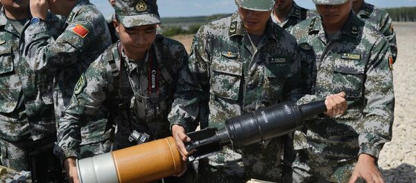 Militares chinos se preparan para el biatlón de tanques Militares chinos se preparan para el biatlón de tanques - Sputnik Mundo