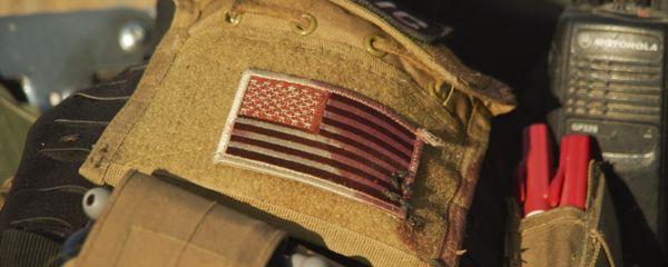 La bandera de EEUU en el uniforme de un médico voluntario en Irak (archivo) - Sputnik Mundo