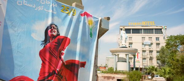 Un cartel promoviendo el referéndum de Kurdistán iraquí Un cartel promoviendo el referéndum de Kurdistán iraquí - Sputnik Mundo