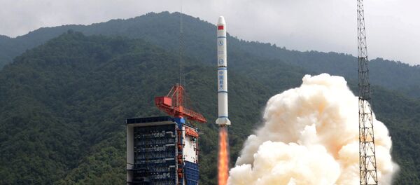 Lanzamiento del cohete chino Larga Marcha 2C - Sputnik Mundo