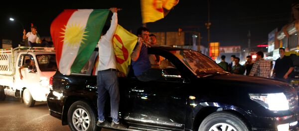 Kurdos iraquíes celebran el referéndum separatista Kurdos iraquíes celebran el referéndum separatista - Sputnik Mundo