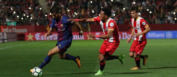 El partido entre FC Barcelon y FC Girona (archivo) El partido entre FC Barcelon y FC Girona (archivo) - Sputnik Mundo