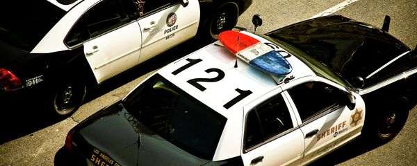 Policía estadounidense Policía estadounidense - Sputnik Mundo