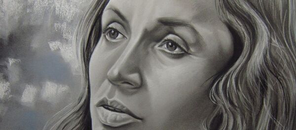 Un mural con la cara de Violeta Parra Un mural con la cara de Violeta Parra - Sputnik Mundo