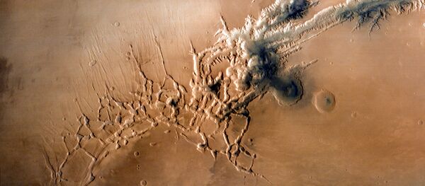 Valles Marineris, el sistema de cañones en la superficie del Marte (imagen referencial) - Sputnik Mundo