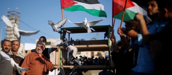 Palestinos celebrando el acuerdo entre Hámas y Al Fatah - Sputnik Mundo