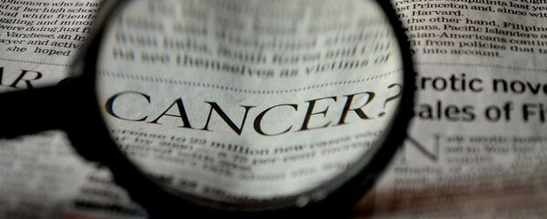 Un artículo sobre el cáncer (imagen referencial) - Sputnik Mundo