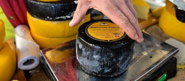 queso sobre una báscula queso sobre una báscula - Sputnik Mundo