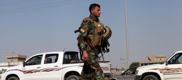 Un soldado peshmerga en la ciudad de Altun Kupri - Sputnik Mundo