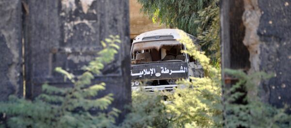 Un vehículo de Daesh abandonado en la ciudad siria de Mayadin - Sputnik Mundo