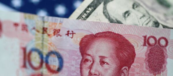 Yuanes y dólares (monedas chinas y estadounidenses) - Sputnik Mundo