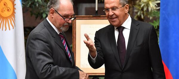 Embajador de Argentina en Rusia Ricardo Lagorio y ministerio ruso de Asuntos Exteriores, Serguéi Lavrov - Sputnik Mundo