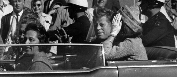 El presidente de EEUU, John F. Kennedy, un minuto antes de ser asesinado - Sputnik Mundo