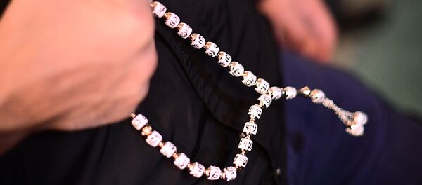 Un musulmán con un tabish en Moscú - Sputnik Mundo