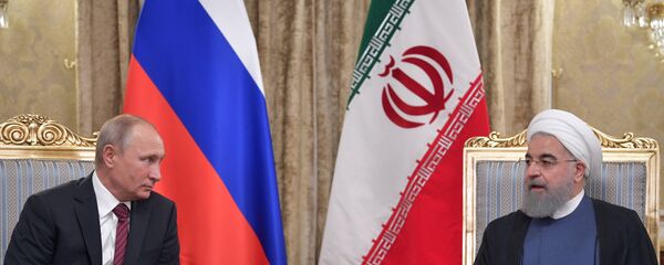 Presidente de Rusia, Vladímir Putin, y presidente de Irán, Hasán Rohani - Sputnik Mundo
