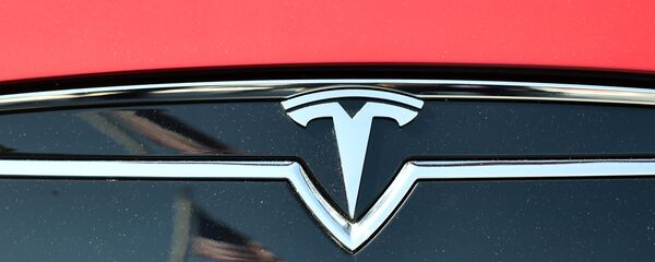 El logo de Tesla - Sputnik Mundo