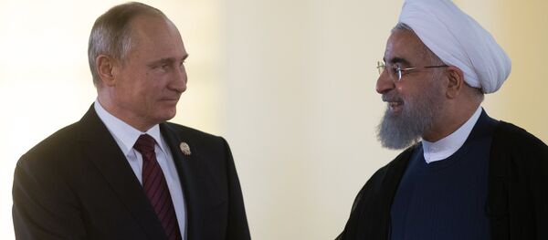 Vladímir Putin y el presidente de Irán Hasán Rohani - Sputnik Mundo