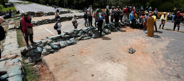 Protestas de los indígenas en Cauca Protestas de los indígenas en Cauca - Sputnik Mundo