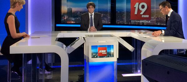 El expresidente del Gobierno catalán, Carles Puigdemont, durante la entrevista - Sputnik Mundo