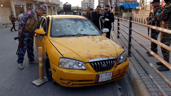 El lugar de uno de los atentados en Kirkuk, Irak El lugar de uno de los atentados en Kirkuk, Irak - Sputnik Mundo