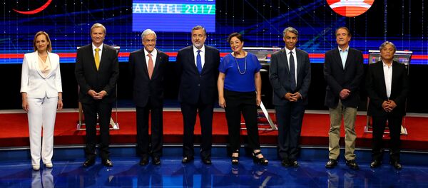 Los candidatos a la presidencia en Chile durante el debate televisivo - Sputnik Mundo