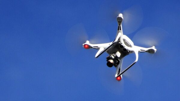 Un dron en el aire Un dron en el aire - Sputnik Mundo